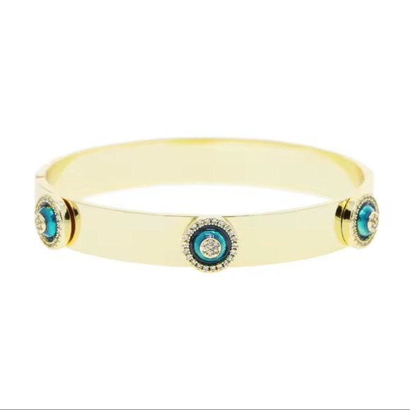 Elegant Gold Bangle with Blue Accents - Picture 1 of 6
